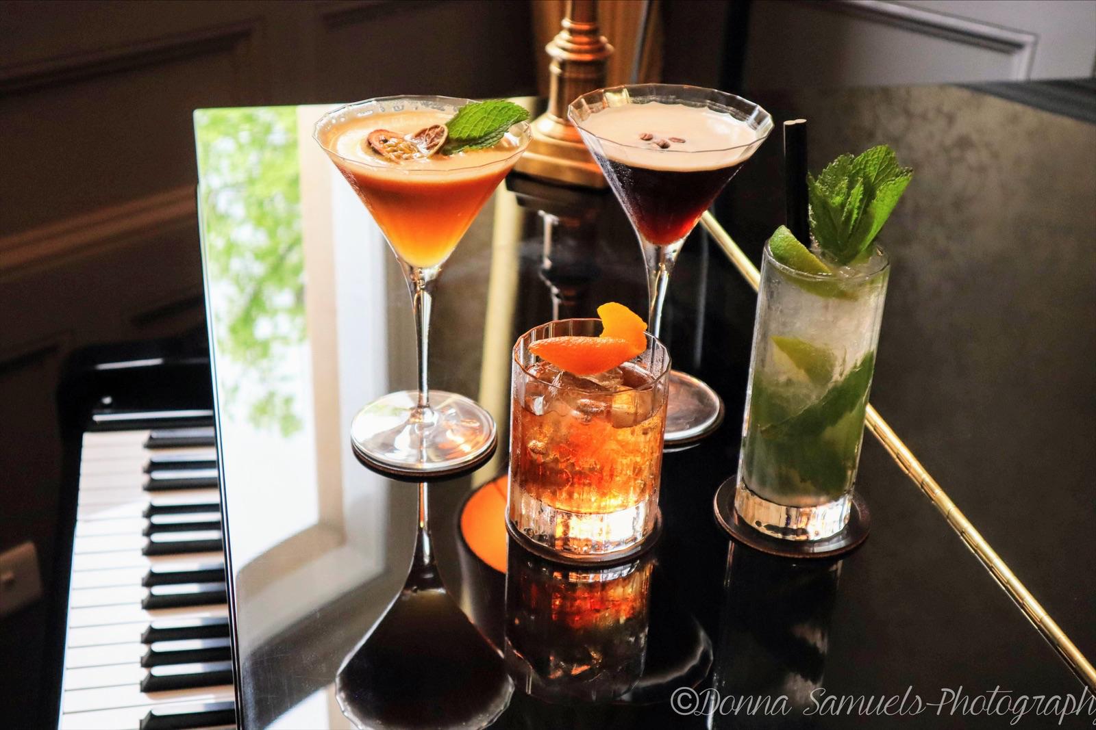 A selection of cocktails on a piano at 3 St Peter's
